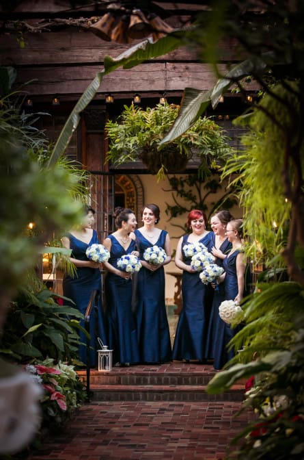 Bridal party in the garden room at a Pleasantdale Chateau Wedding