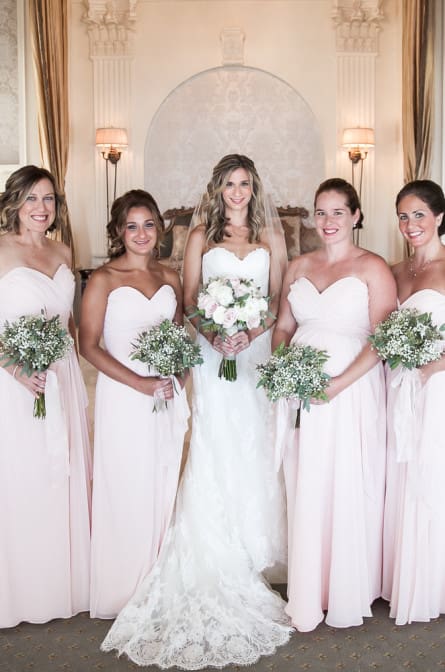 bride and her bridesmaids in the bridal suite