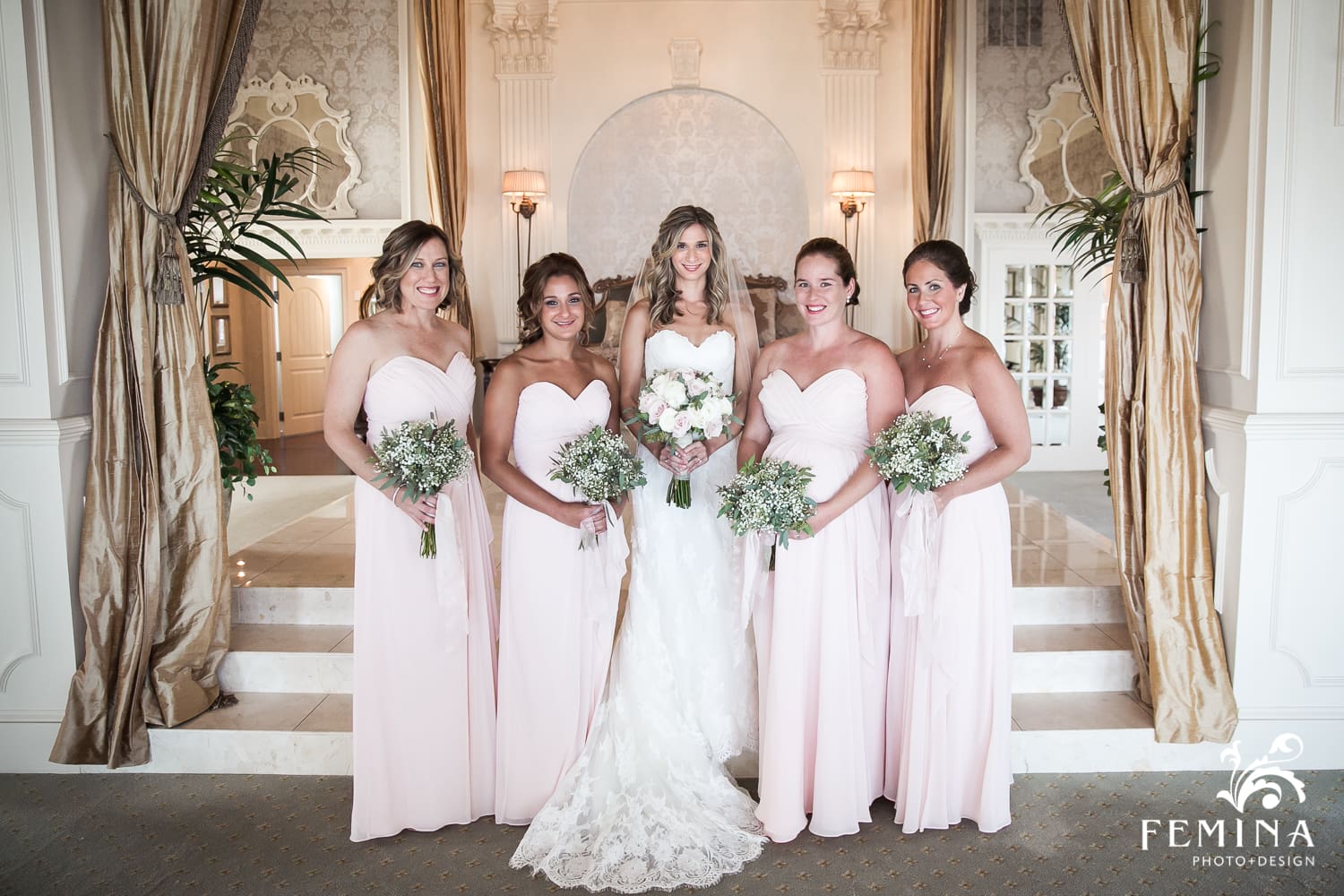 bride and her bridesmaids in the bridal suite