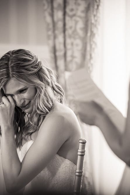 black and white photo of bride crying