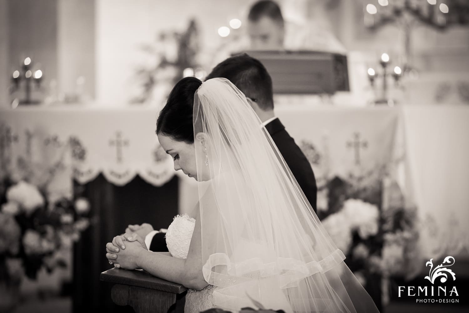 bride and groom praying