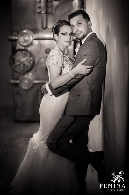 bride and groom posing in the vault at Union Trust