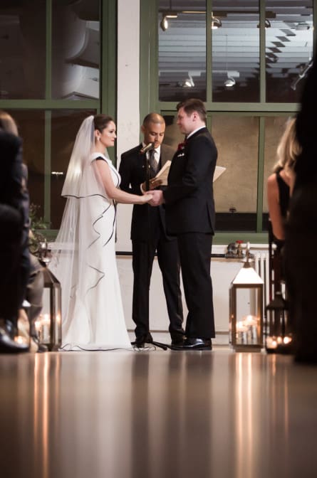 bride and groom exchanging vows at Industry City Brooklyn