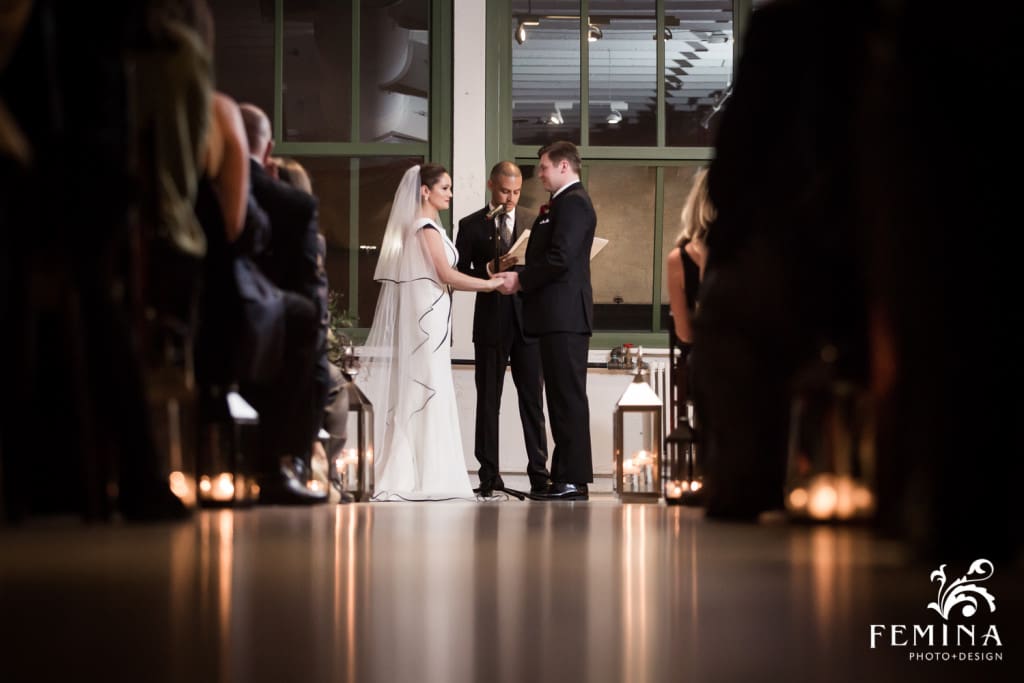 Bride and groom exchanging vows in their Industry City Brooklyn wedding ceremony