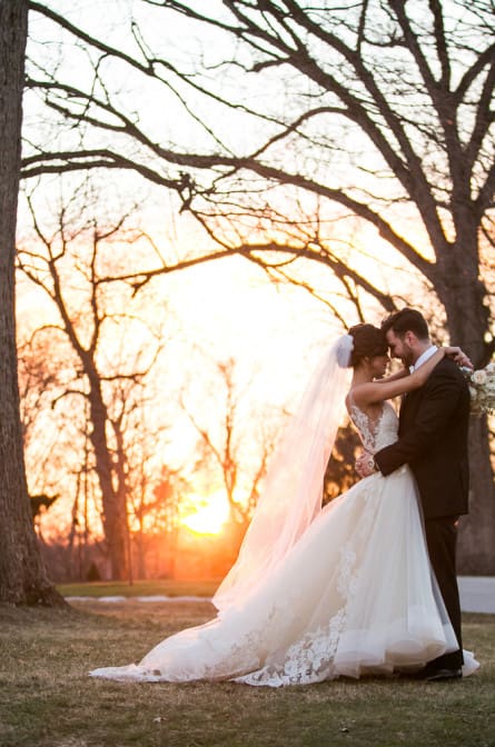 portrait of bride and groom at sunset