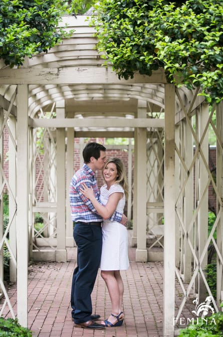 Rebecca and Lyall posing under an archway at 18th Century Garden in Philadelphia