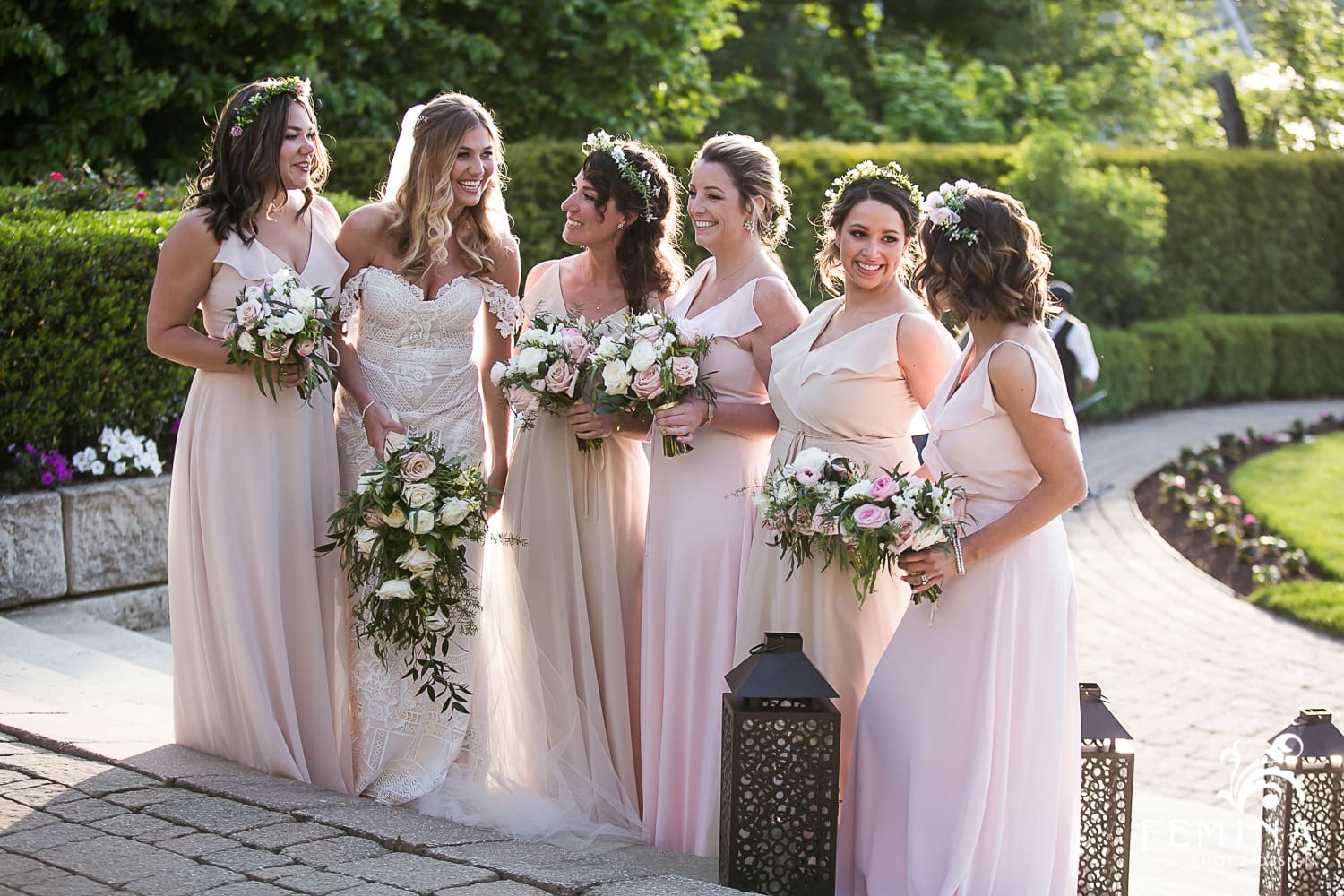 Kelli and her bridesmaids at sunset at her Lake House Inn Wedding