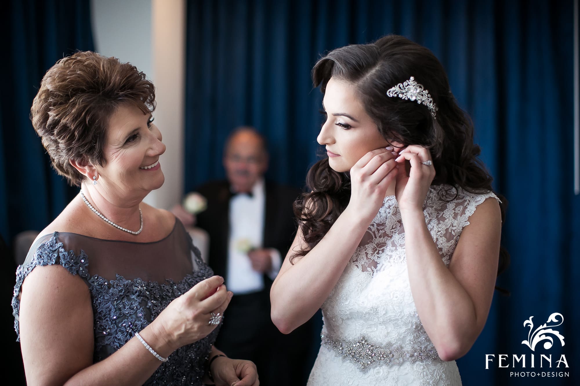 Christina's mom helping her put her earrings on at NYLO hotel in NYC