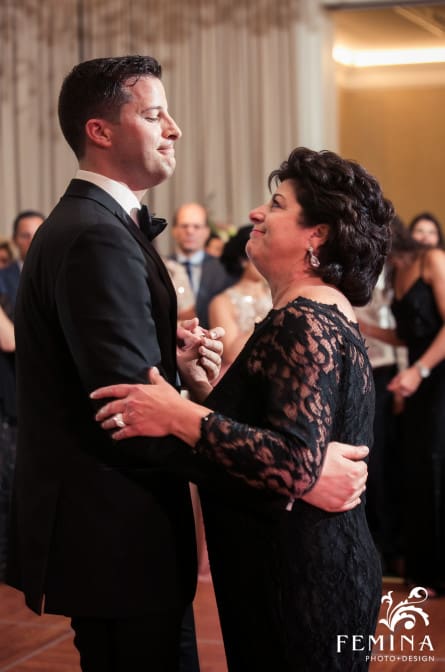 Ryan and his mom dancing during their mother and son dance at the New York Botanical Garden