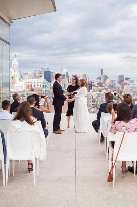 Bride and groom marry at their rooftop ceremony in NYC at The Standard hotel