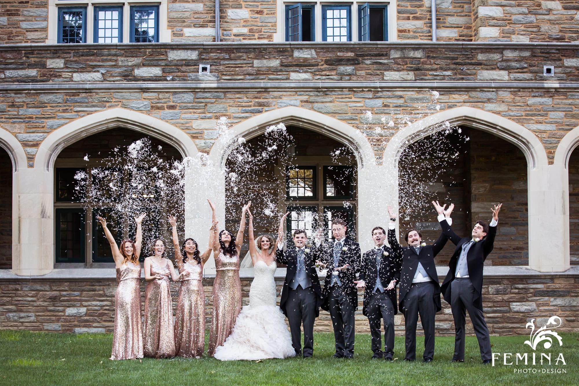 Michelle and Max throw confetti with their bridal party at Saint Andrews School in Delaware