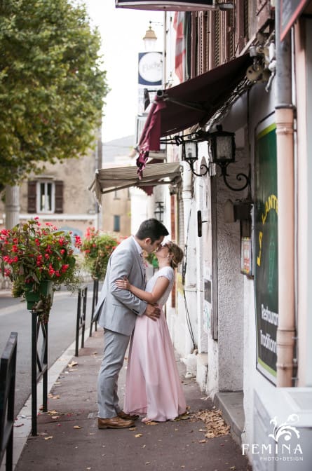 Emmalyn and Vincent stop for a kiss in his home town of Saint-Vallier-de-Thiey