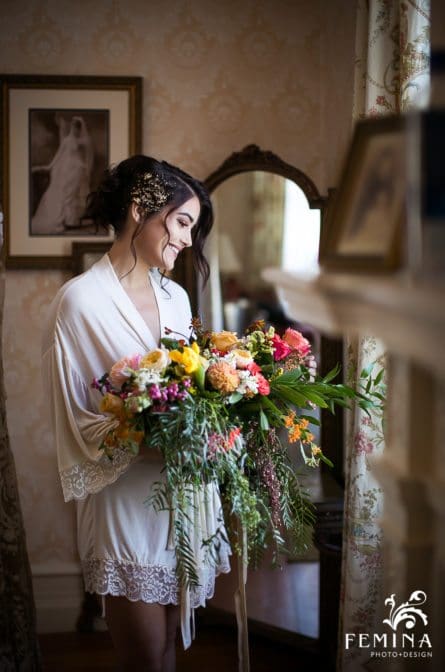 Brook holds her bouquet in her dressing room at Cairnwood