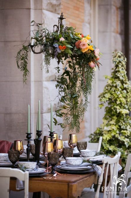 A floral detail hangs over Brook and Tony's Bride and Groom's table