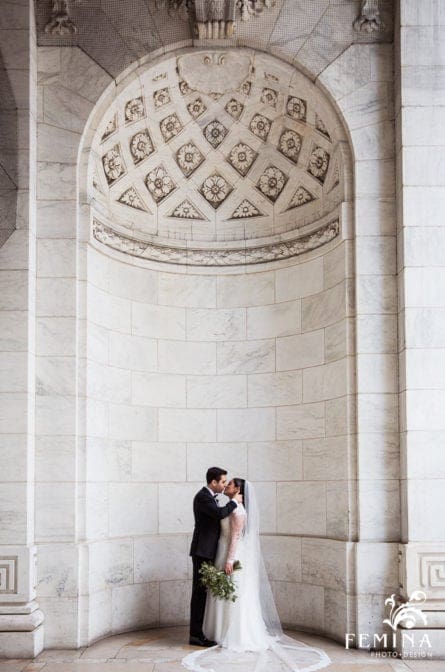 Couple kisses at Bryant Park Wedding