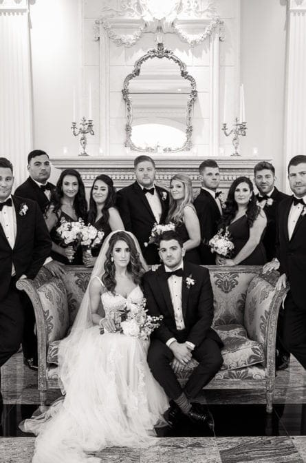 Wedding Party portrait in front of the fireplace at The Rockleigh