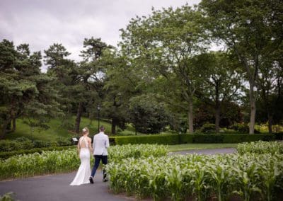 Bride and Groom walking in the Botanical Gardens