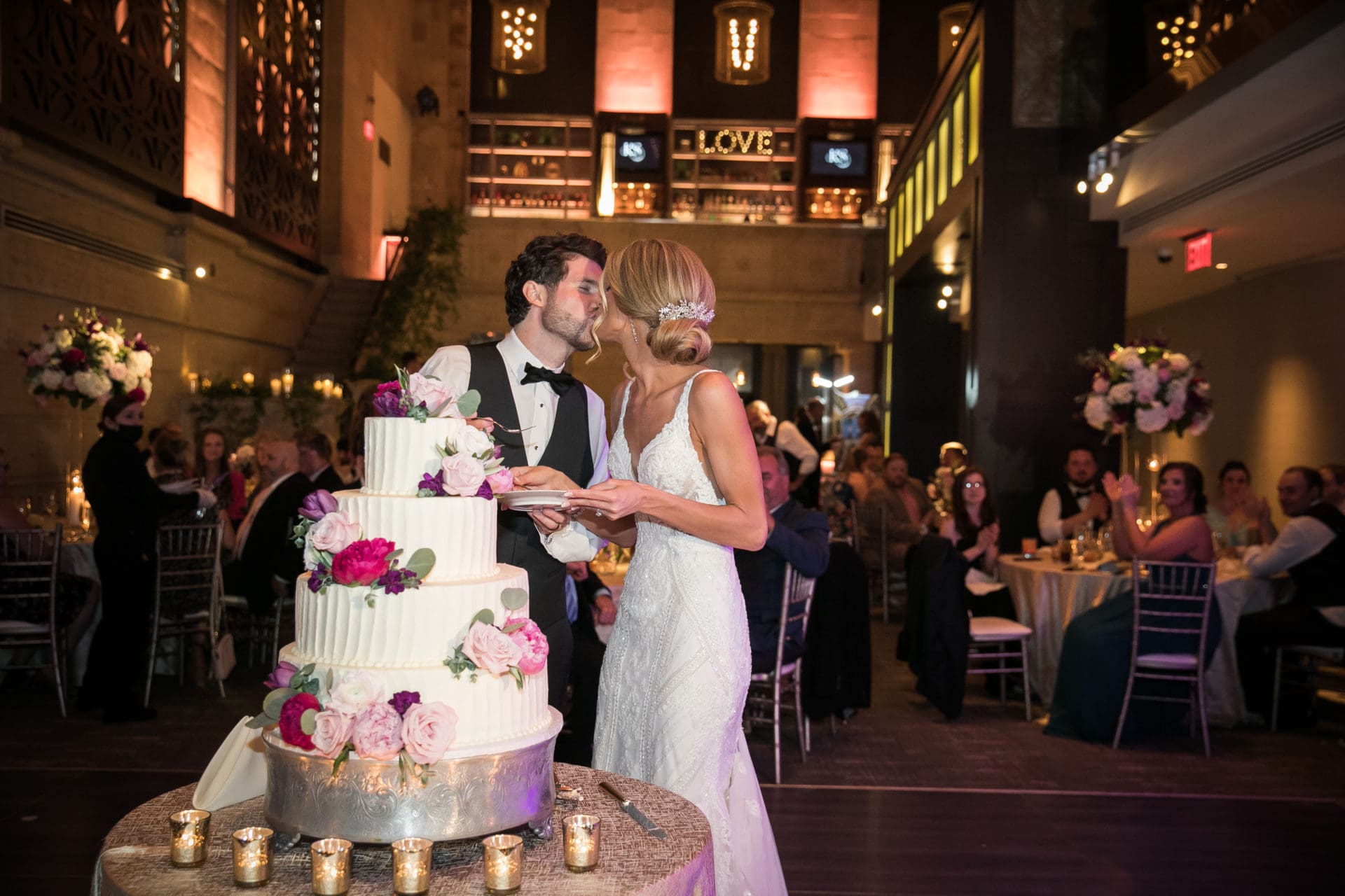 Bride and groom cake cutting at Union Trust wedding in Philadephia